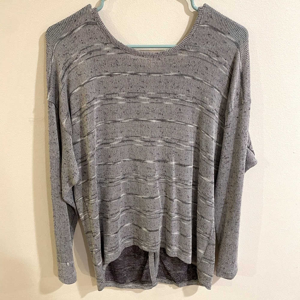 Grey sweater with bow detail. Size large.